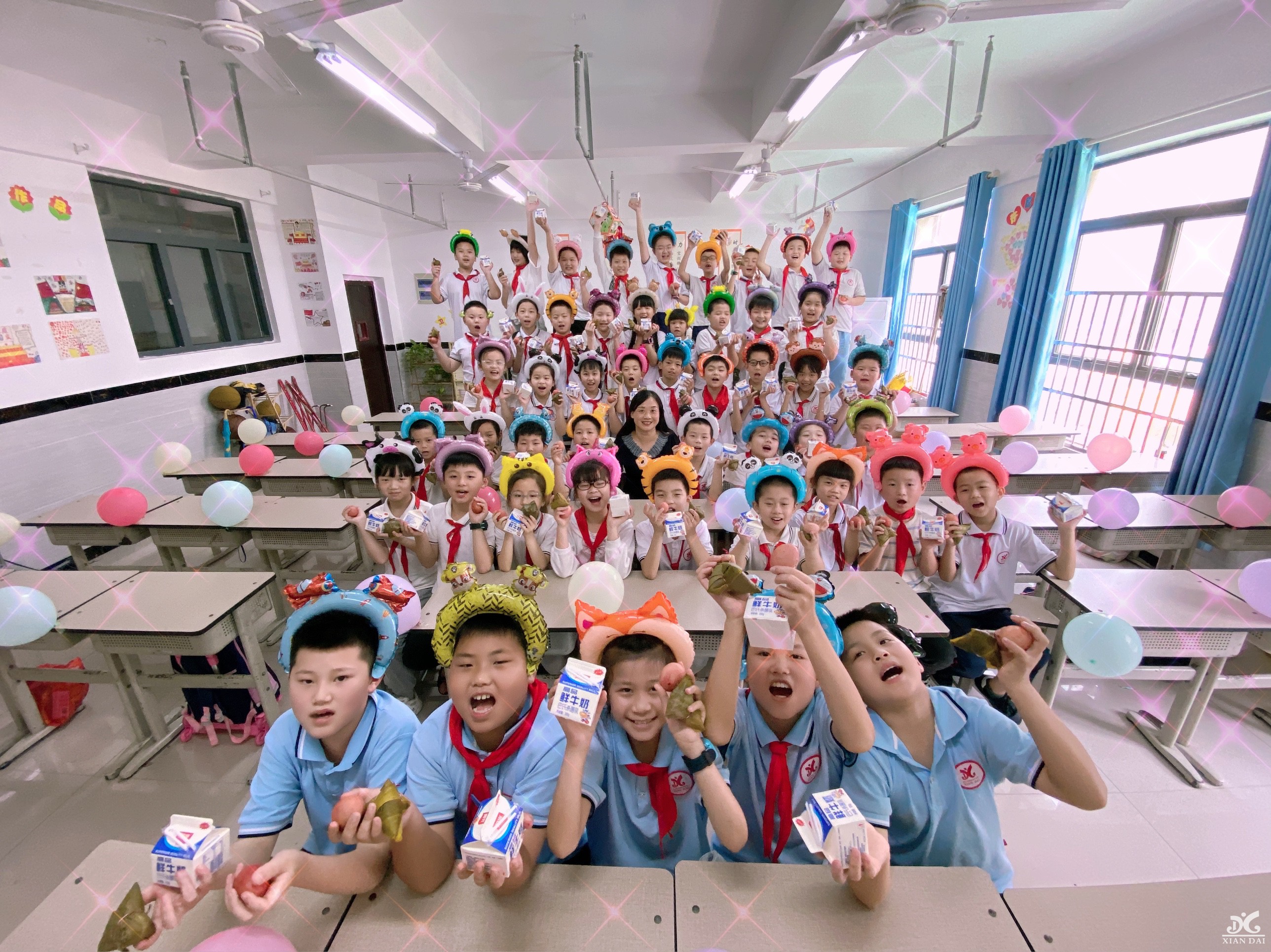 南昌現(xiàn)代外國(guó)語(yǔ)學(xué)校開(kāi)展“歡樂(lè)六一，遇上粽香端午”慶?；顒?dòng)